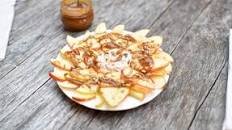 Apple nachos with peanut butter caramel sauce