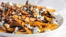 Baked Sweet Potato Fries Topped with Walnuts, Blue Cheese, and Balsamic Reduction
