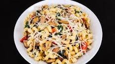 Cavatappi Pasta with Turkey Italian Sausage, Mushrooms, Tomatoes, and Kale