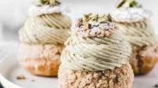 Cream puffs with Pistachio creme mousseline and raspberry jam