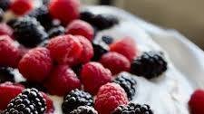 Easy Berry Pavlova with Vanilla Bean Whipped Cream