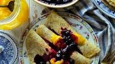 Lemon Poppyseed Crepes with Blueberry Sauce