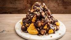 Profiteroles with hazelnut brittle and chocolate shells