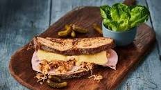 Raclette cheese sandwich with cornichons